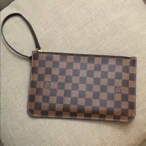 Louis Vuitton wristlet from “neverfull”